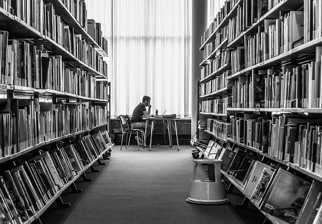 a student conducting research in a library