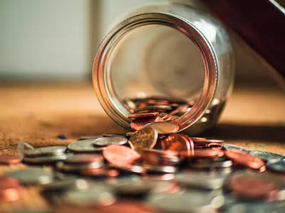a jar of coins representing affordability