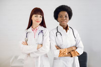  two female nurses from different specialties standing next to each other